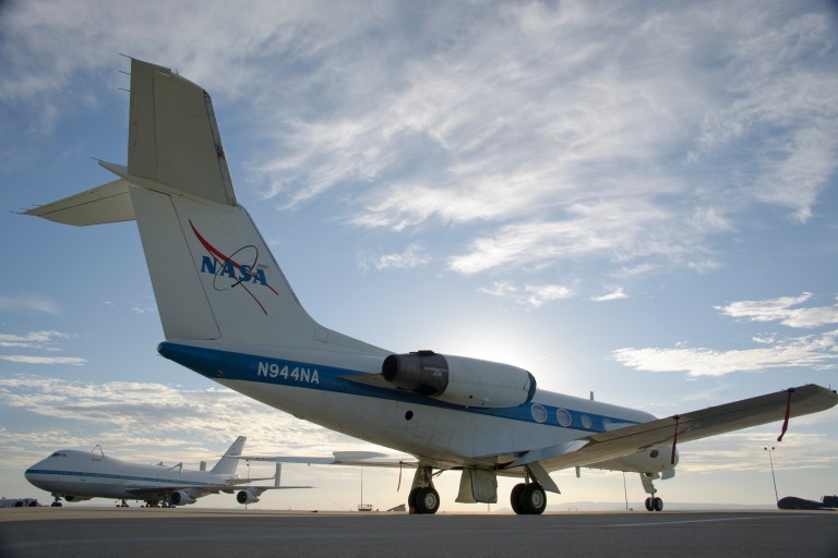 Aircraft parked on the tarmac.