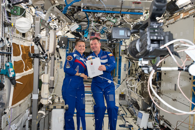 Cosmonauts Elena Serova and Alexander Samokutyaev