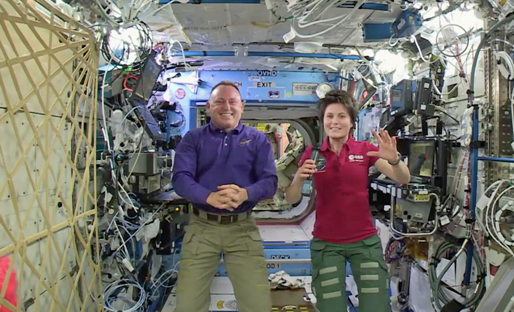 Expedition 42 Commander Barry Wilmore and Flight Engineer Samantha Cristoforetti answer questions posed by CBS and BBC reporters on Dec. 30, 2014.