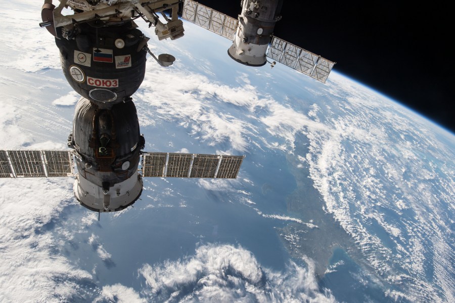 ISS042E101429 (01/05/2014) --- This image, photographed by one of the Expedition 42 crew members aboard the International Space Station, shows the the Soyuz TMA-15M spacecraft on the left attached to the Rassvet module on the Earth-facing port of the Russian segment of the station that delivered Expedition 42 crewmembers Anton Shkaplerov of the Russian Federal Space Agency (Roscosmos), Terry Virts of NASA and Samantha Cristoforetti of the European Space Agency on Nov. 24, 2014 , and to the right, the unpiloted ISS Progress 57 cargo craft that is docked to the Pirs Docking Compartment and which arrived at the station a month earlier on Oct. 29, 2014.