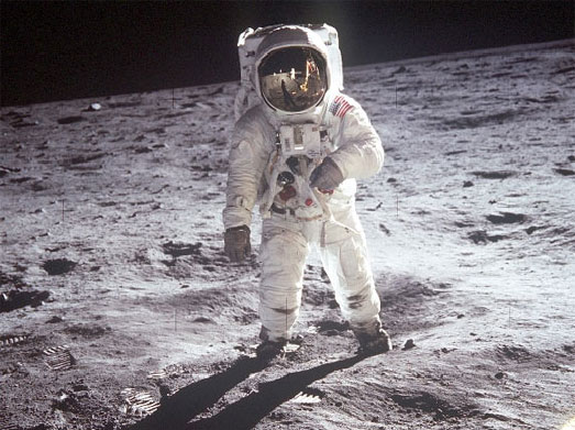Neil Armstrong standing on the lunar surface