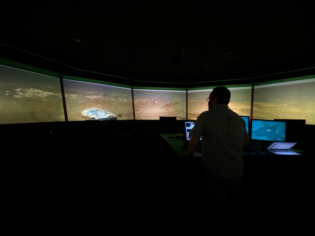 FutureFlight Central (FFC) showing a panoramic view of the Mars landscape and the Opportunity rover's landing site at Eagle Crater.