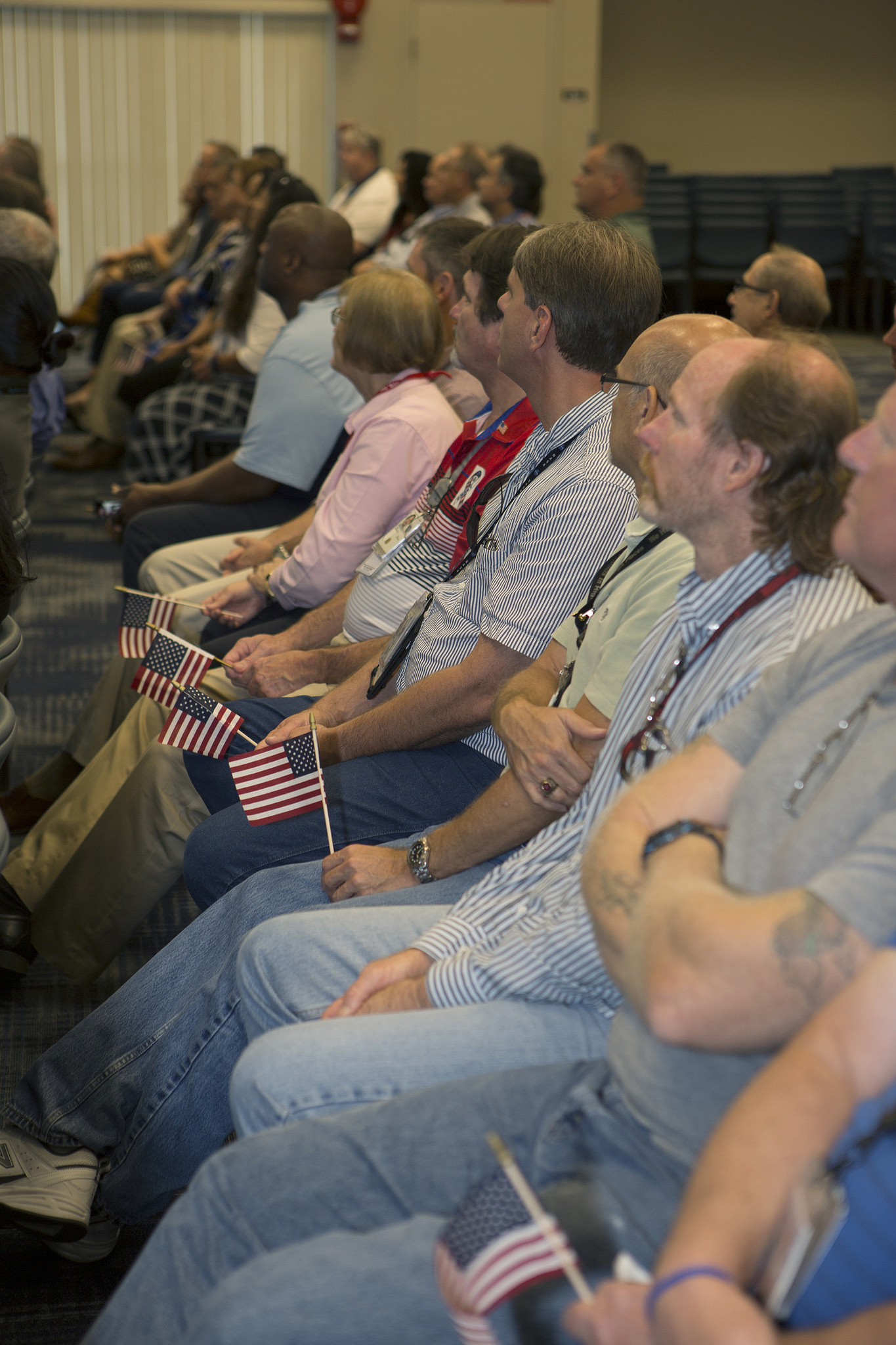 Kennedy space Center workers gather to pay tribute to veterans during recognition event.
