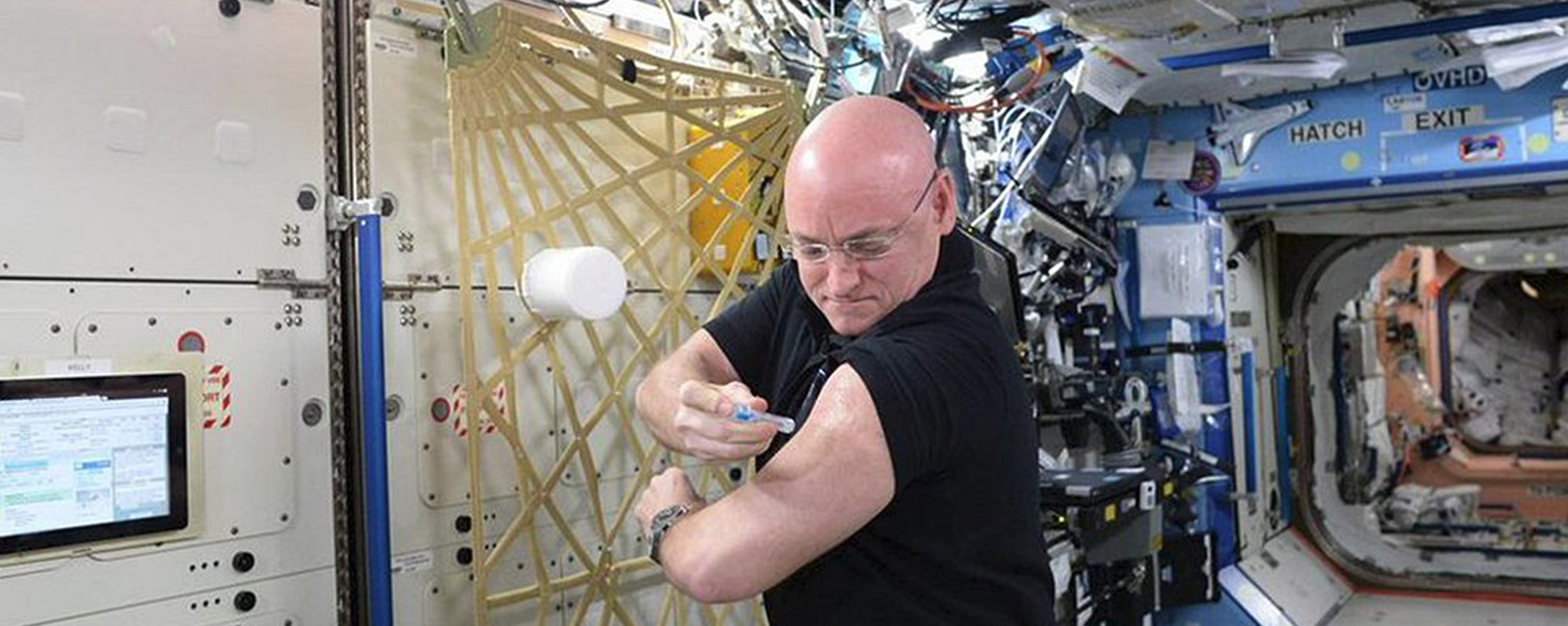 Scott Kelly Gives Himself a Flu Shot on ISS