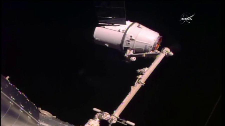 SpaceX Dragon in the Grips of the Canadarm2