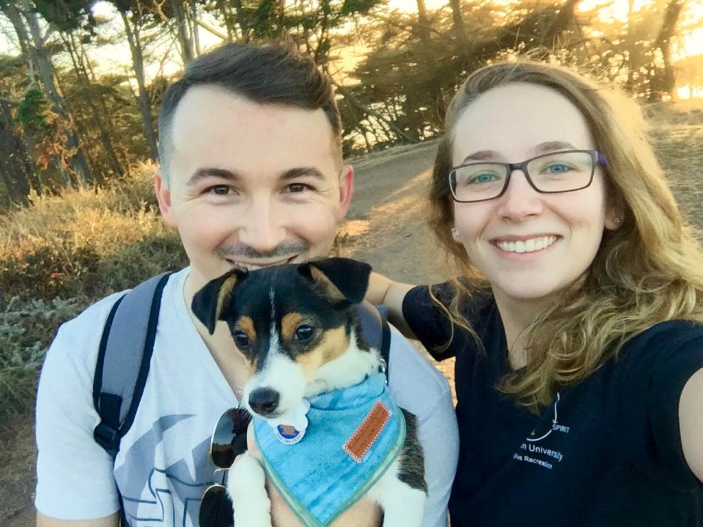 Courtney Batterson with Alex, and Mabel, their dog at Baker Beach in SF.