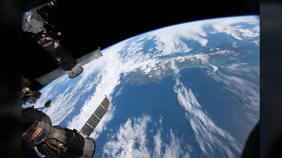 The International Space Station orbits above New Zealand.