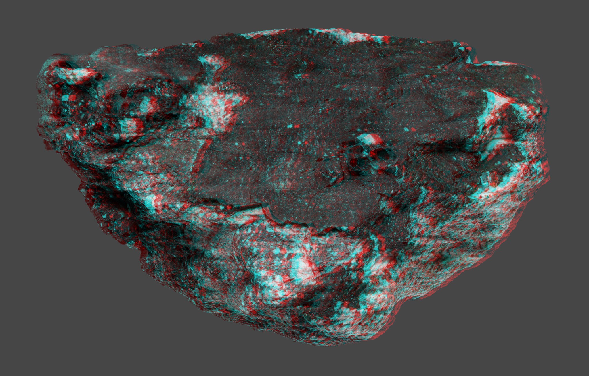 Anaglyph version of the world’s first image-based 3D reconstruction of an Apollo lunar sample—3D glasses required! (Credit: These image data were produced at NASA’s Acquisition & Curation Office and was funded by NASA Planetary Data Archiving, Restoration, and Tools Program, Proposal No.: 15-PDART15_2-0041.