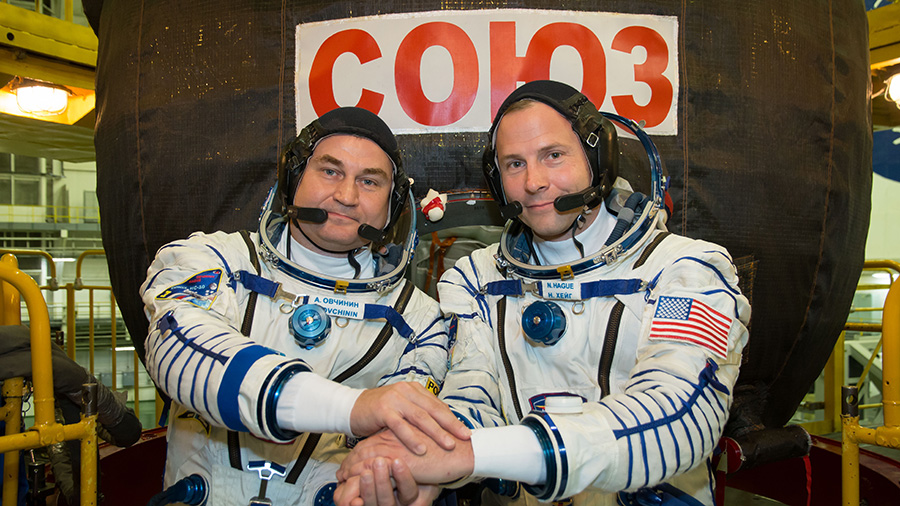 Expedition 57 crew members Alexey Ovchinin of Roscosmos (left) and Nick Hague of NASA