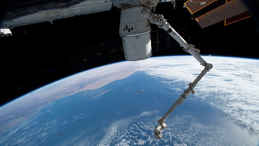 The SpaceX Dragon cargo craft and the Canadarm2