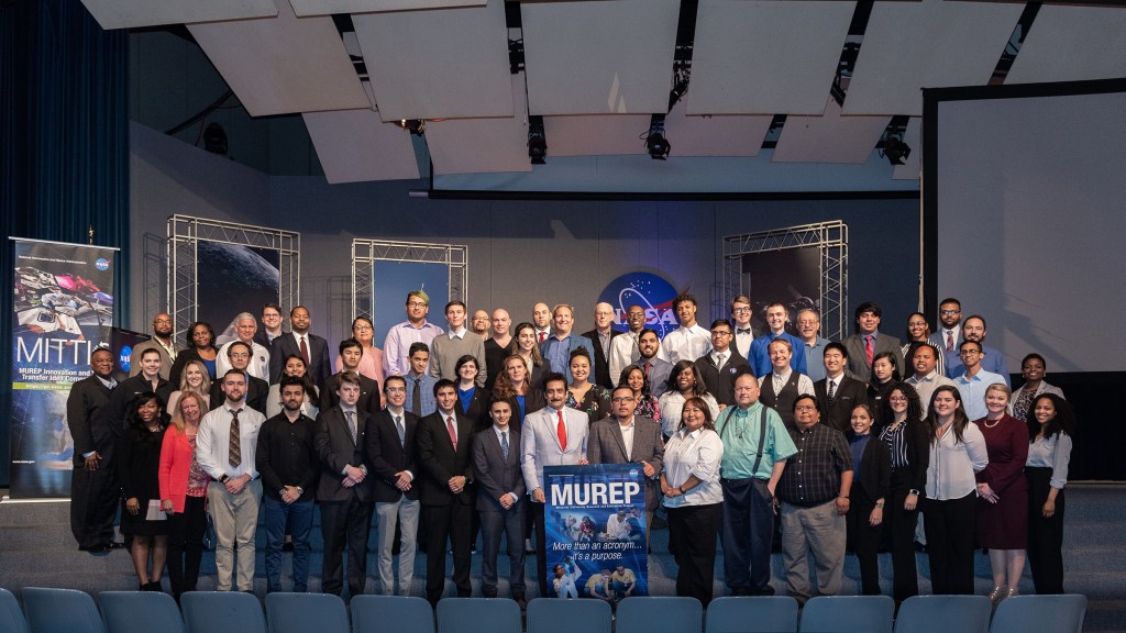 MITTIC participants, professors and leaders pose for photo in the Teague Auditorium on the first day of Space Tank