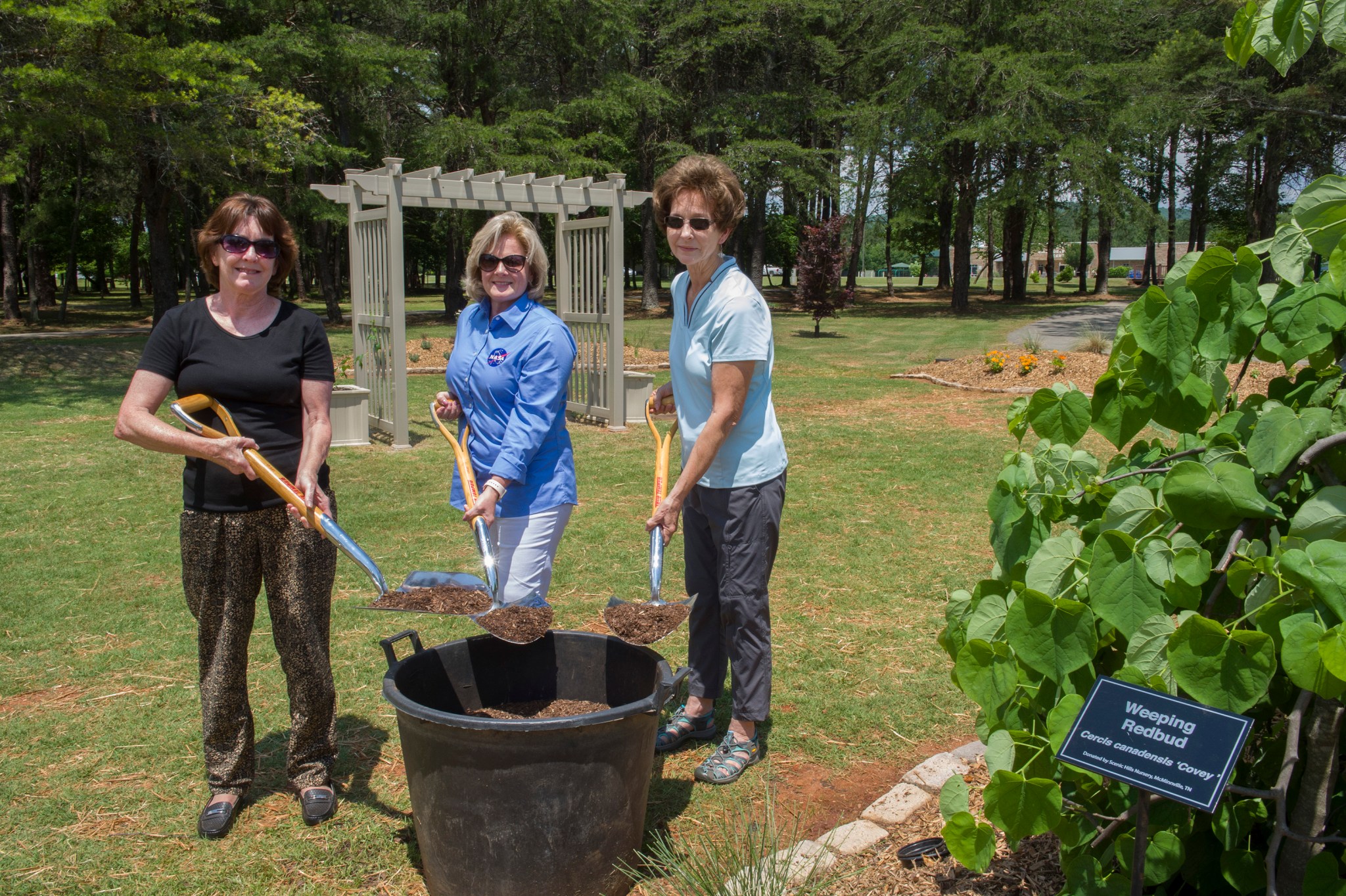 Jody Singer, center, joins Donna Leach, left, and Janet Boothe, right.