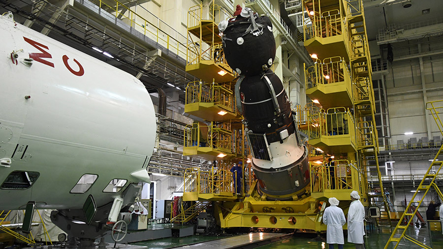 The Soyuz MS-14 spacecraft is processed for launch