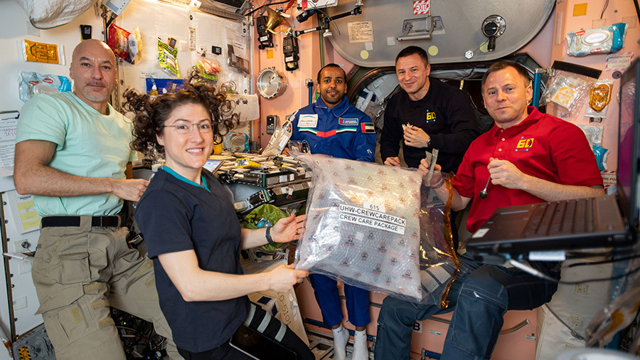 Four Expedition 60 crewmembers and a spaceflight participant