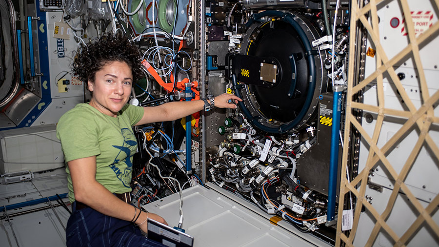 Astronaut Jessica Meir works on the Combustion Integrated Rack