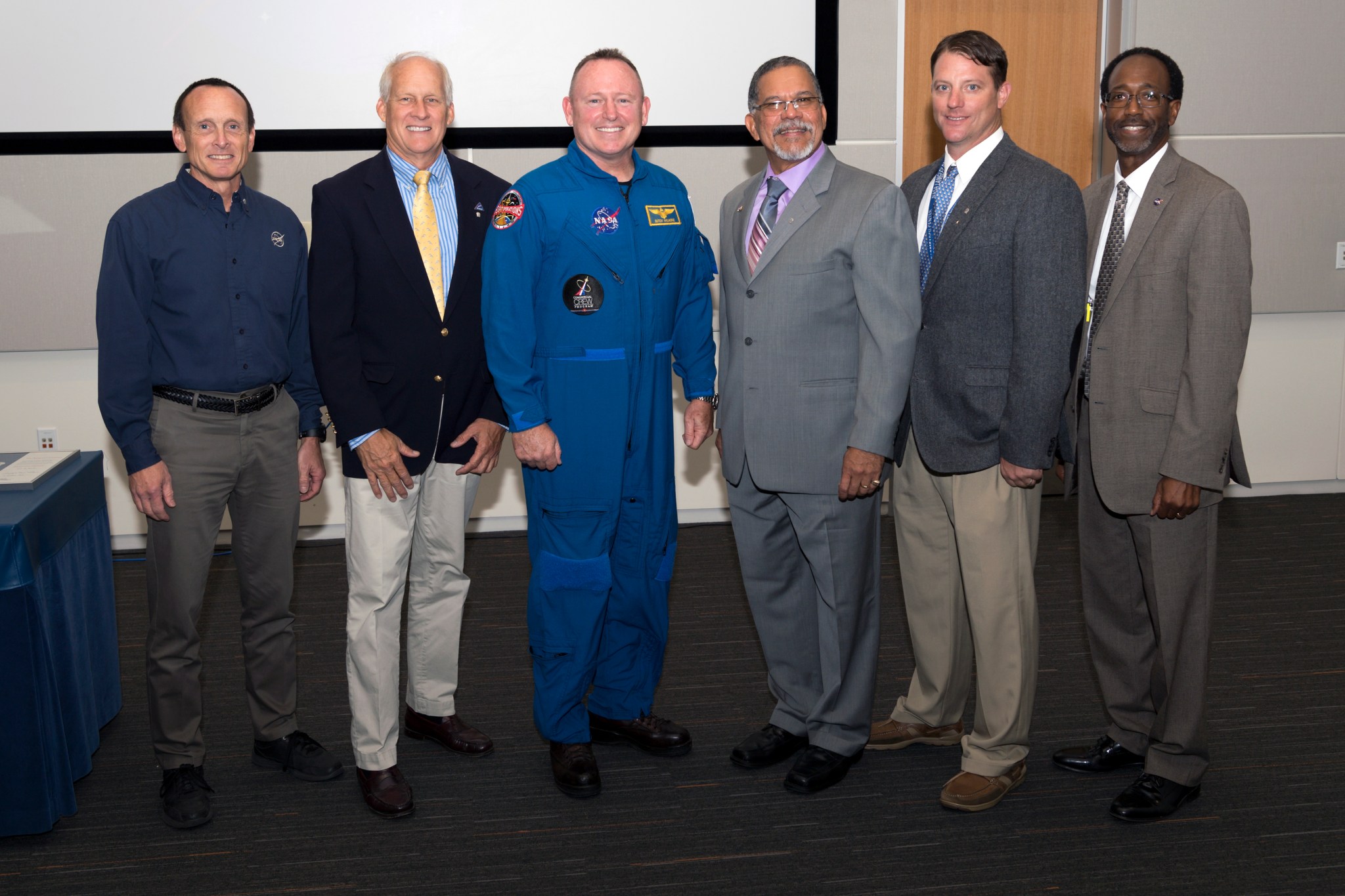 Silver Snoopy awards winners pose with astronaut Barry E. “Butch” Wilmore and Langley Center Director Clayton Turner.