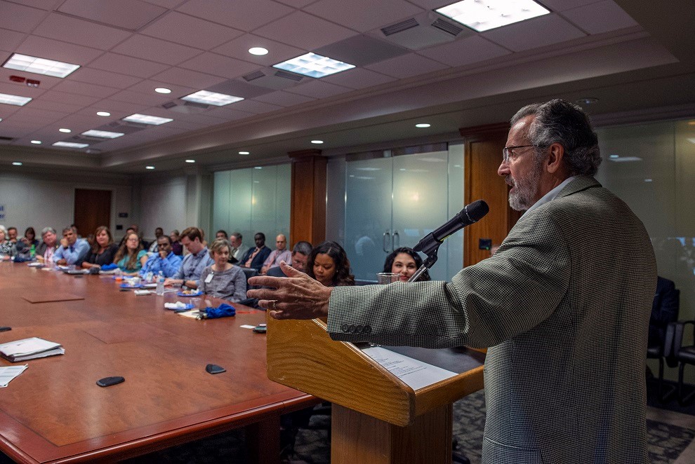 Retired NASA engineer and program manager Pedro “Pete” Rodriguez, right, speaks to NASA’s Marshall Space Flight Center team.