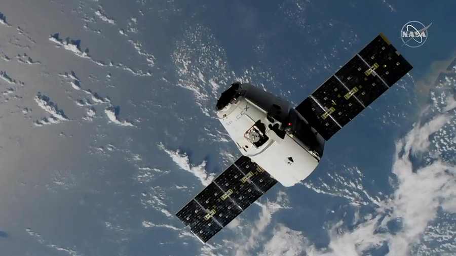 The SpaceX Dragon resupply ship approaches the International Space Station