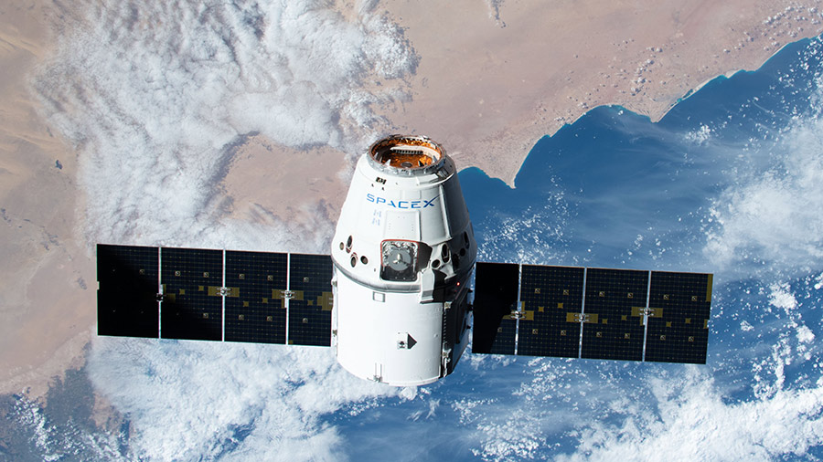 The SpaceX Dragon resupply ship approaches the International Space Station