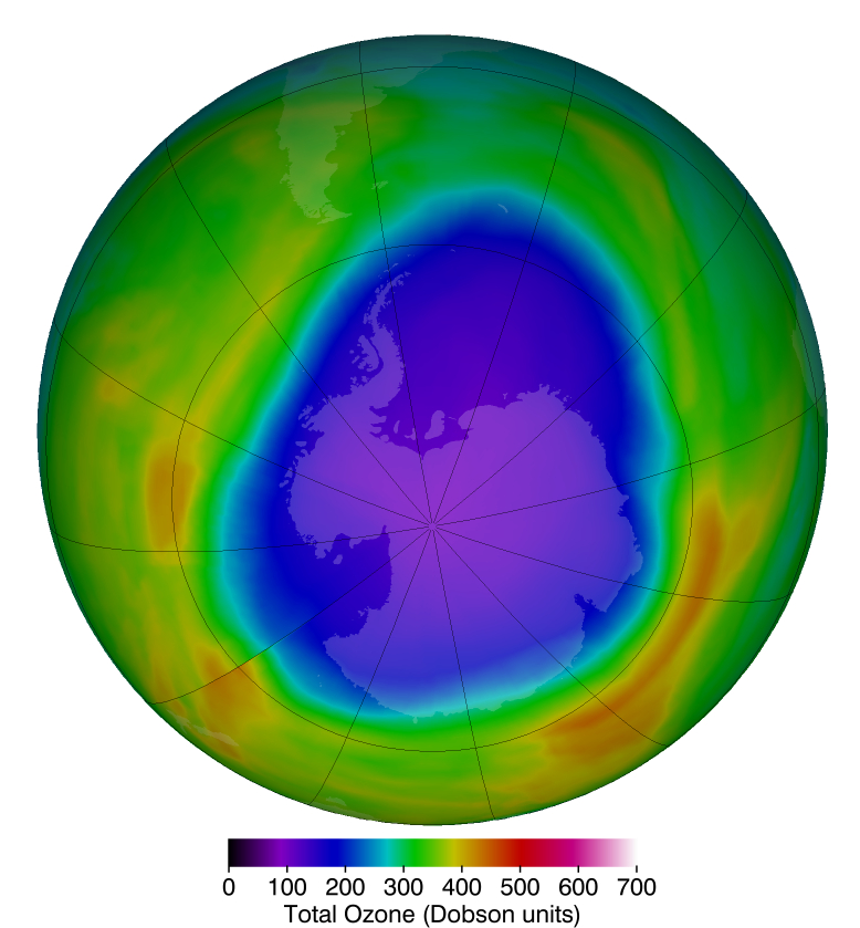 View of the Antarctic ozone hole on globe showing ozone data for October 12, 2018. Low levels shown in blue and purple in an oval over Antarctica.