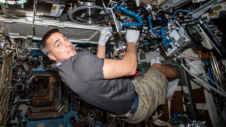 Expedition 63 Commander Chris Cassidy works in the Combustion Integrated Rack