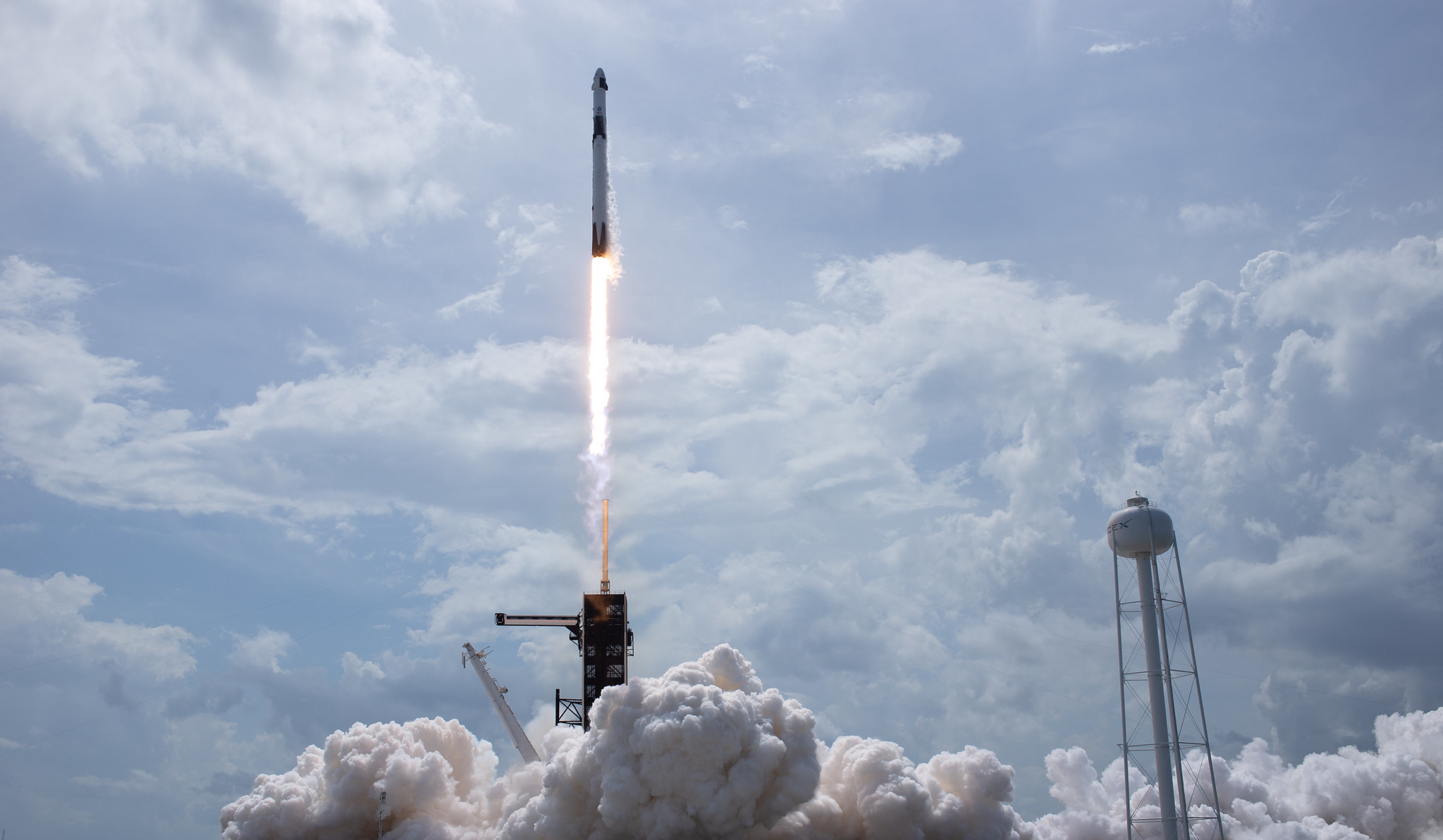 A SpaceX Falcon 9 rocket carrying the company's Crew Dragon spacecraft is launched from Launch Complex 39A