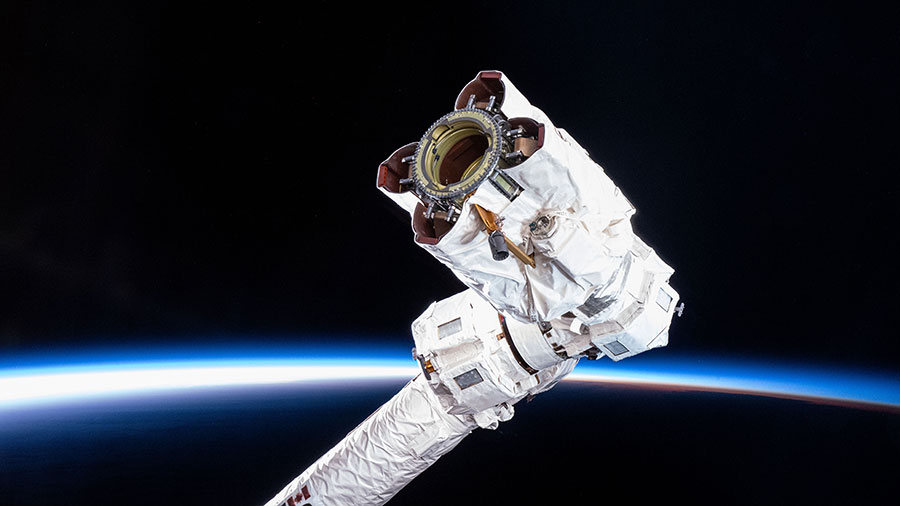 The tip of the Canadarm2 robotic arm which grapples hardware, science experiments and approaching spaceships, is pictured as the station soared over the South Pacific Ocean.