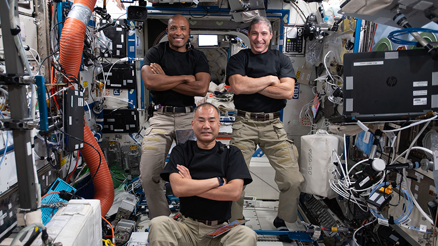 Expedition 64 Flight Engineers (clockwise from top left) Victor Glover, Michael Hopkins and Soichi Noguchi pose together for a playful portrait inside the U.S. Destiny laboratory module.