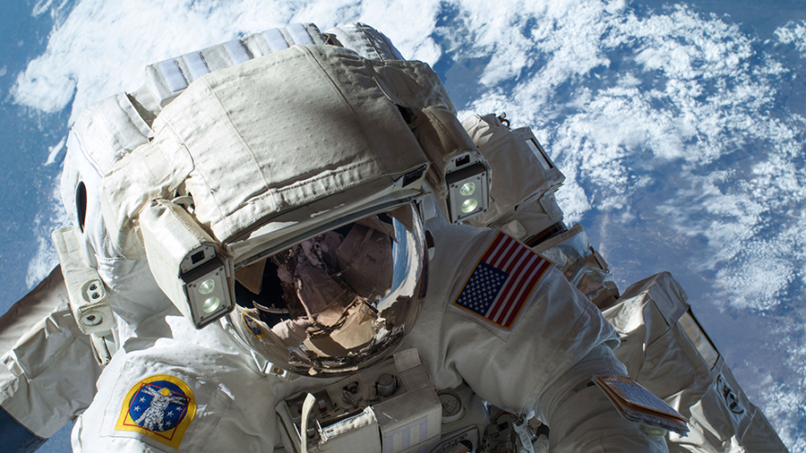 NASA astronaut Mike Hopkins participates in a spacewalk in December of 2013 at the space station during Expedition 38.