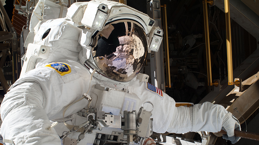 NASA astronaut Mike Hopkins participates in a spacewalk in December of 2013 at the space station during Expedition 38.