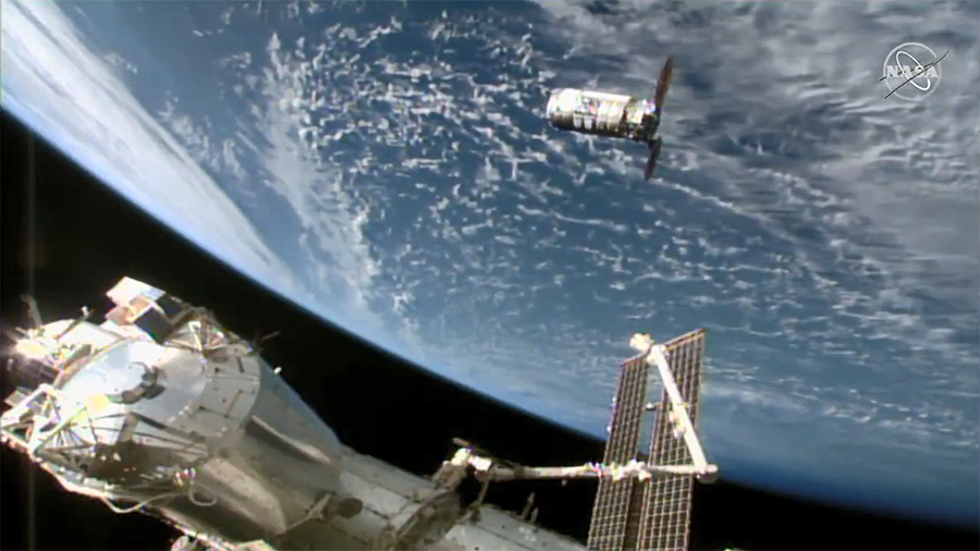 The Northrop Grumman Cygnus resupply ship is pictured about 30 meters away from the space station approaching its capture point near the Canadarm2 robotic arm. Credit: NASA TV