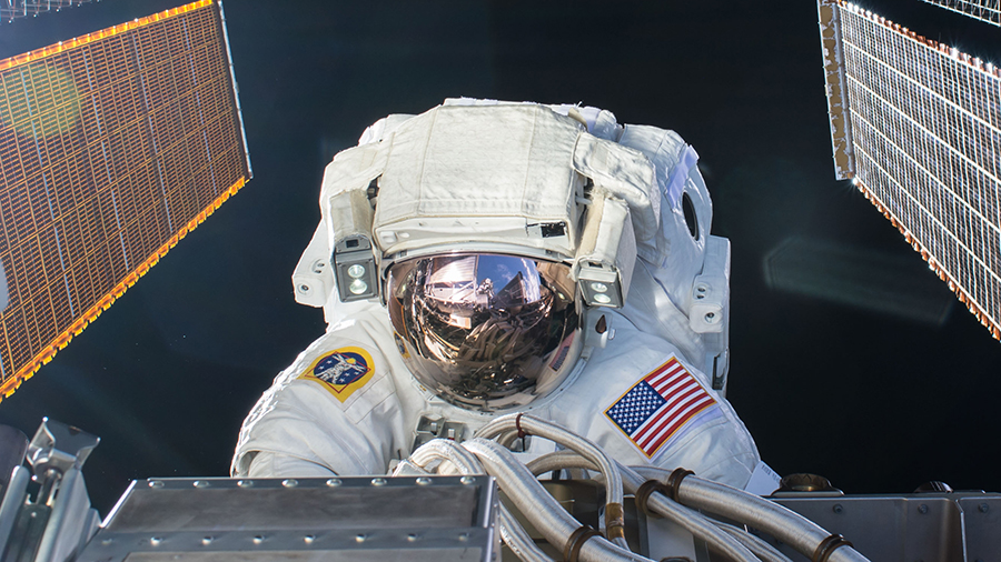 NASA astronaut Kate Rubins is pictured during a spacewalk in September of 2016 working on solar array maintenance.