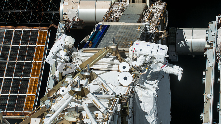 From left, NASA astronauts Kate Rubins and Jeff Williams are pictured during a spacewalk in September of 2016 performing solar array maintenance.