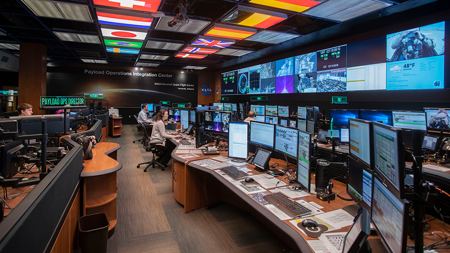 Payload controllers are pictured working inside the Payload Operations Integration Center, the science command post for the space station located at NASAâs Marshall Space Flight Center in Huntsville, Ala.