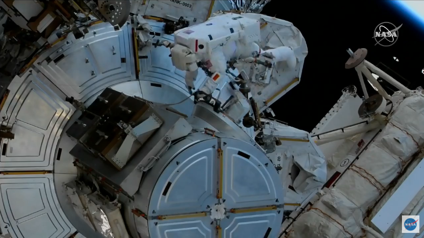 On March 13, 2021, NASA spacewalker and Expedition 64 Flight Engineer Victor Glover works to route cables and complete tasks that were deferred from previous spacewalks during this yearâs fifth spacewalk in support of space station maintenance. Credits: NASA