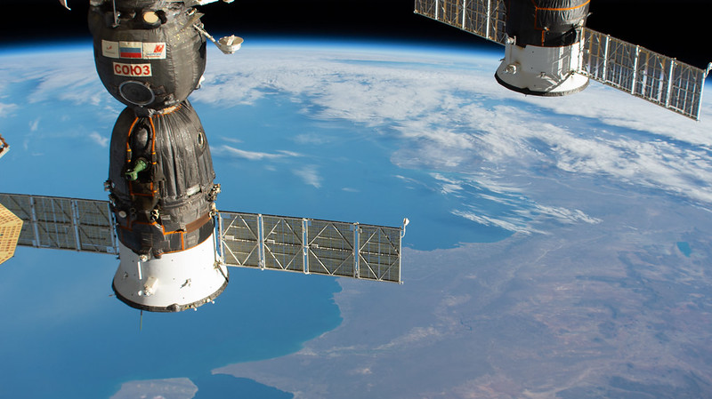 Two Russian spacecraft are seen docked to the International Space Station as it orbited 269 miles above southern Argentina. At left is the Soyuz MS-17 crew ship that will soon undock from the Rassvet module and relocate to the Poisk module, making room for three new crew members due to launch April 9 aboard the Soyuz MS-18 crew ship. At right is the aft end of the Progress 77 cargo craft docked to the Pirs docking compartment. Credits: NASA