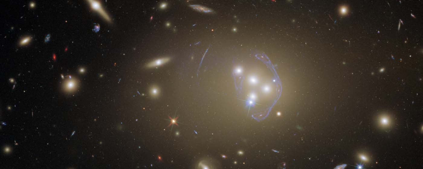 Hubble Gazes at a Cluster Full of Cosmic Clues