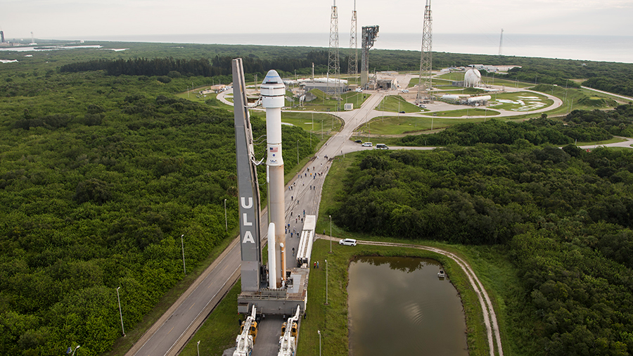 Boeing’s CST-100 Starliner spacecraft atop the United Launch Alliance Atlas V rocket rolls out to the launch pad on Monday at Cape Canaveral Space Force Station in Florida.