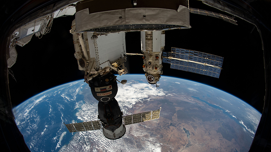 Russia's Soyuz MS-18 crew ship (foreground) and Nauka Multipurpose Laboratory Module are pictured docked to the station as it orbited above Africa's Indian Ocean coast.