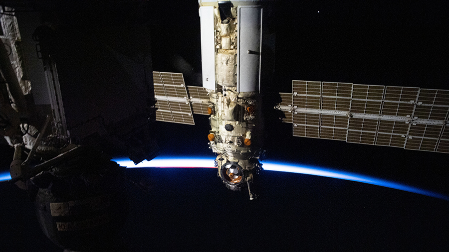 Russia's Nauka multipurpose laboratory module is pictured as the station orbited into a sunset above the southern Indian Ocean.