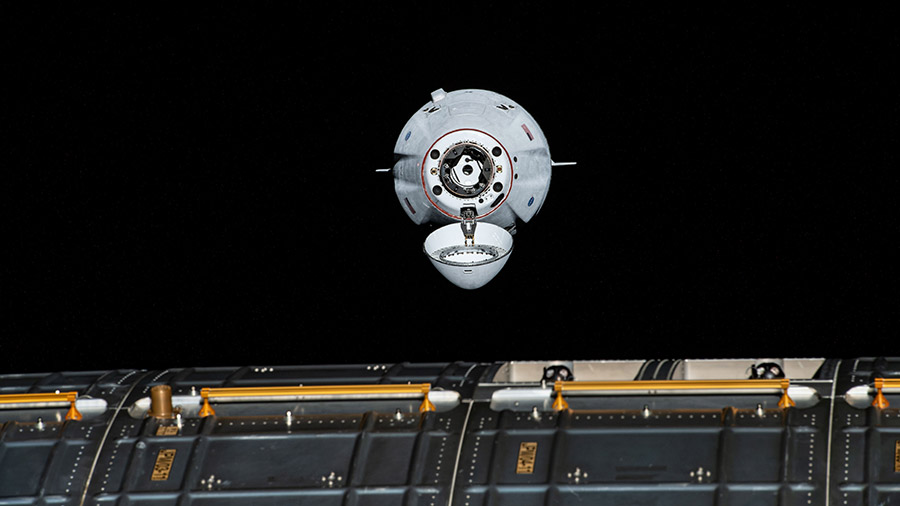 The SpaceX Cargo Dragon vehicle is pictured approaching the station on Aug. 30 for an autonomous docking to the Harmony module's forward international docking adapter.