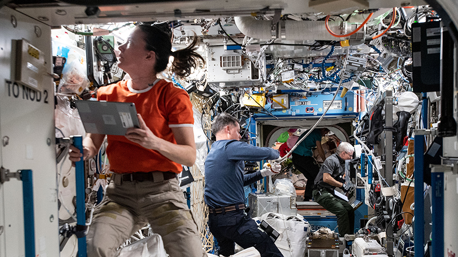 NASA Flight Engineers Megan McArthur, Shane Kimbrough and Mark Vande Hei work inside the U.S. Destiny laboratory module.