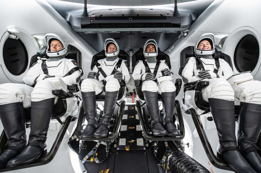 The astronauts of SpaceX Crew-3 pose for a portrait in their suits during a training session inside the SpaceX Crew Dragon spacecraft. From left are, ESA (European Space Agency) astronaut Matthias Maurer and NASA astronauts Thomas Marshburn, Raja Chari and Kayla Barron.