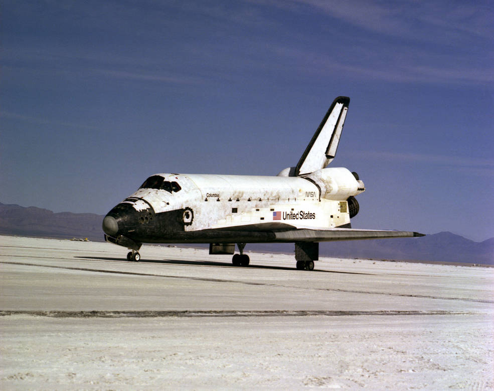 STS-3 is parked in the New Mexico desert after its return from space.