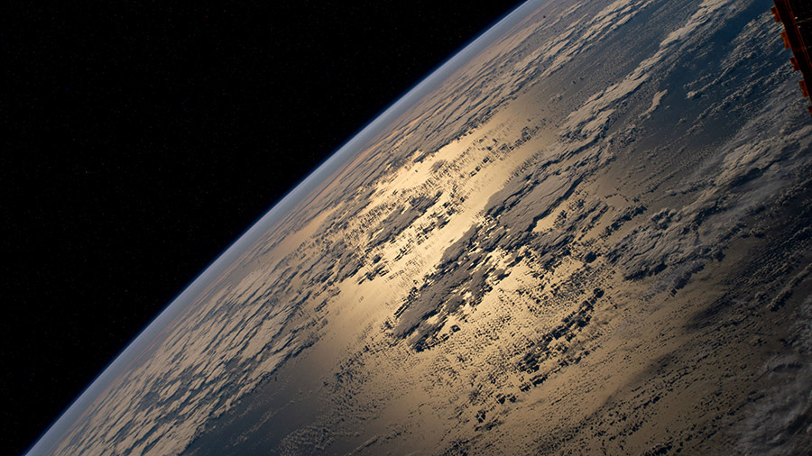 The Sun's light glints off the Atlantic Ocean in this photograph from the International Space Station as it orbited 262 miles above.