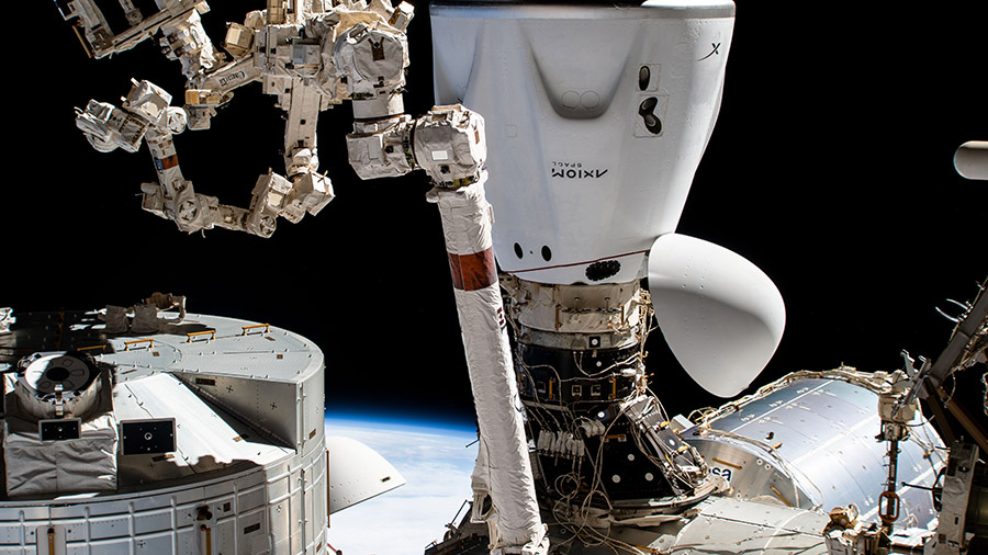 The SpaceX Dragon Endeavour crew ship that carried four Axiom Mission 1 astronauts to the space station is pictured docked to the Harmony module.