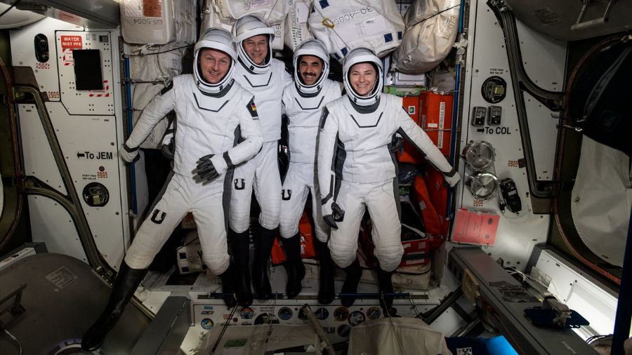 The four commercial crew astronauts representing the SpaceX Crew-3 mission are pictured in their Dragon spacesuits for a fit check on April 21, 2022.