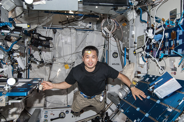 image of an astronaut wearing a monitor on his forehead