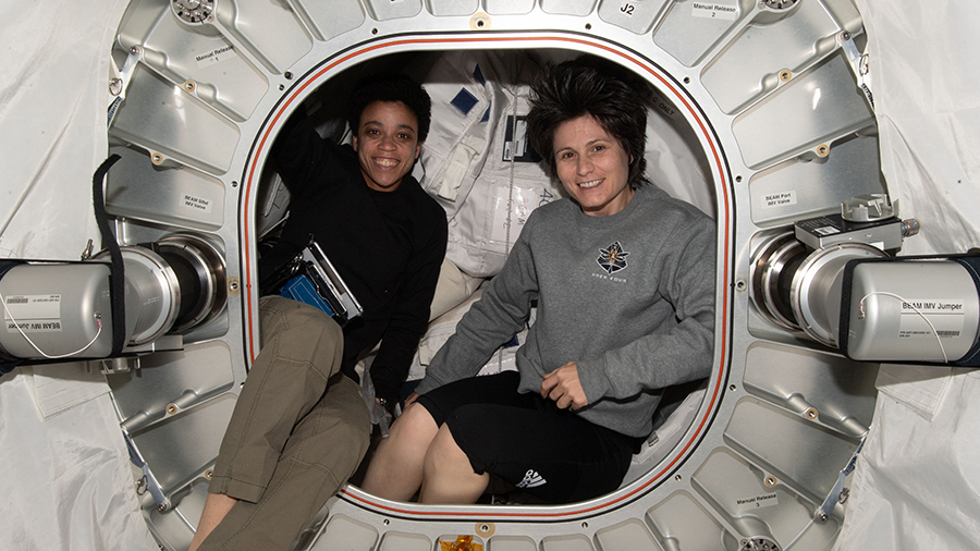 Astronauts (from left) Jessica Watkins and Samantha Cristoforetti are pictured inside the Bigelow Expandable Activity Module (BEAM) during cargo stowage activities.