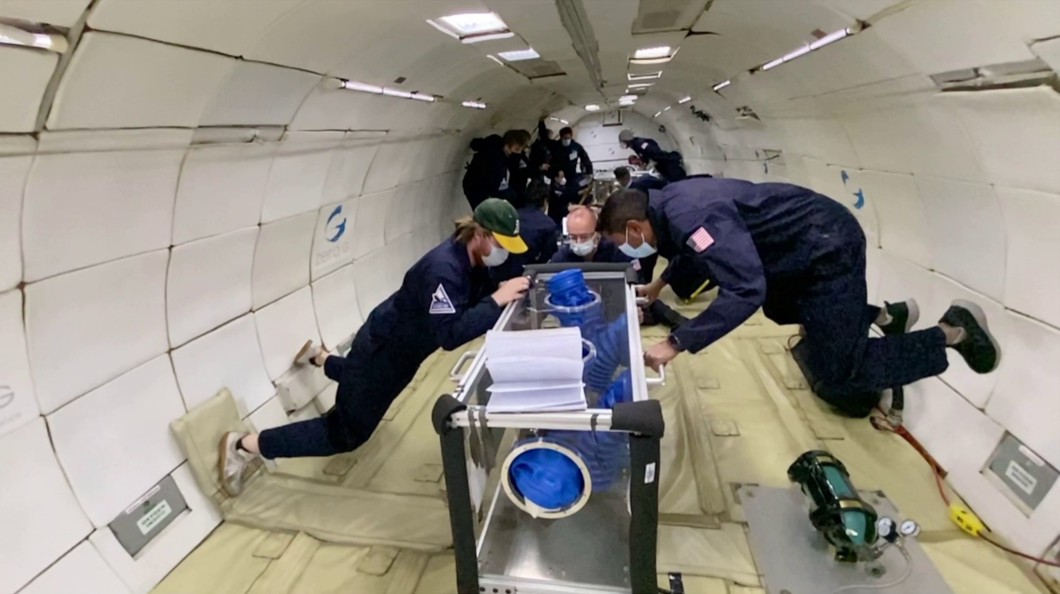 Tests being conducted on a zero gravity flight.